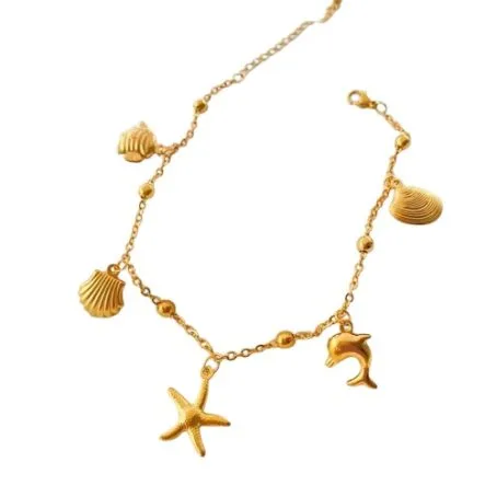 Bracelet cheville et bracelet breloque océan doré : étoile de mère, dauphin, coquillage, coquille saint jacques et poisson. Bracelet qui fait du bruit